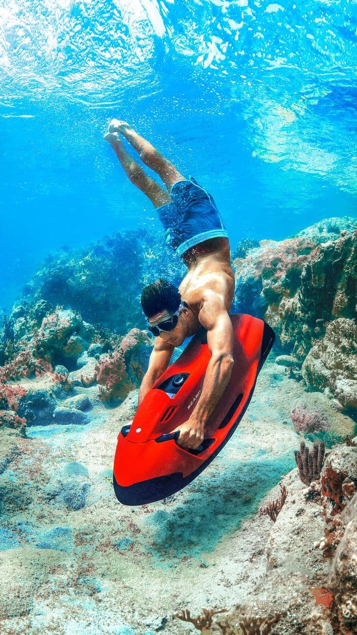 Wajer Seabob red underwater with goggles coral sea ocean guy man male